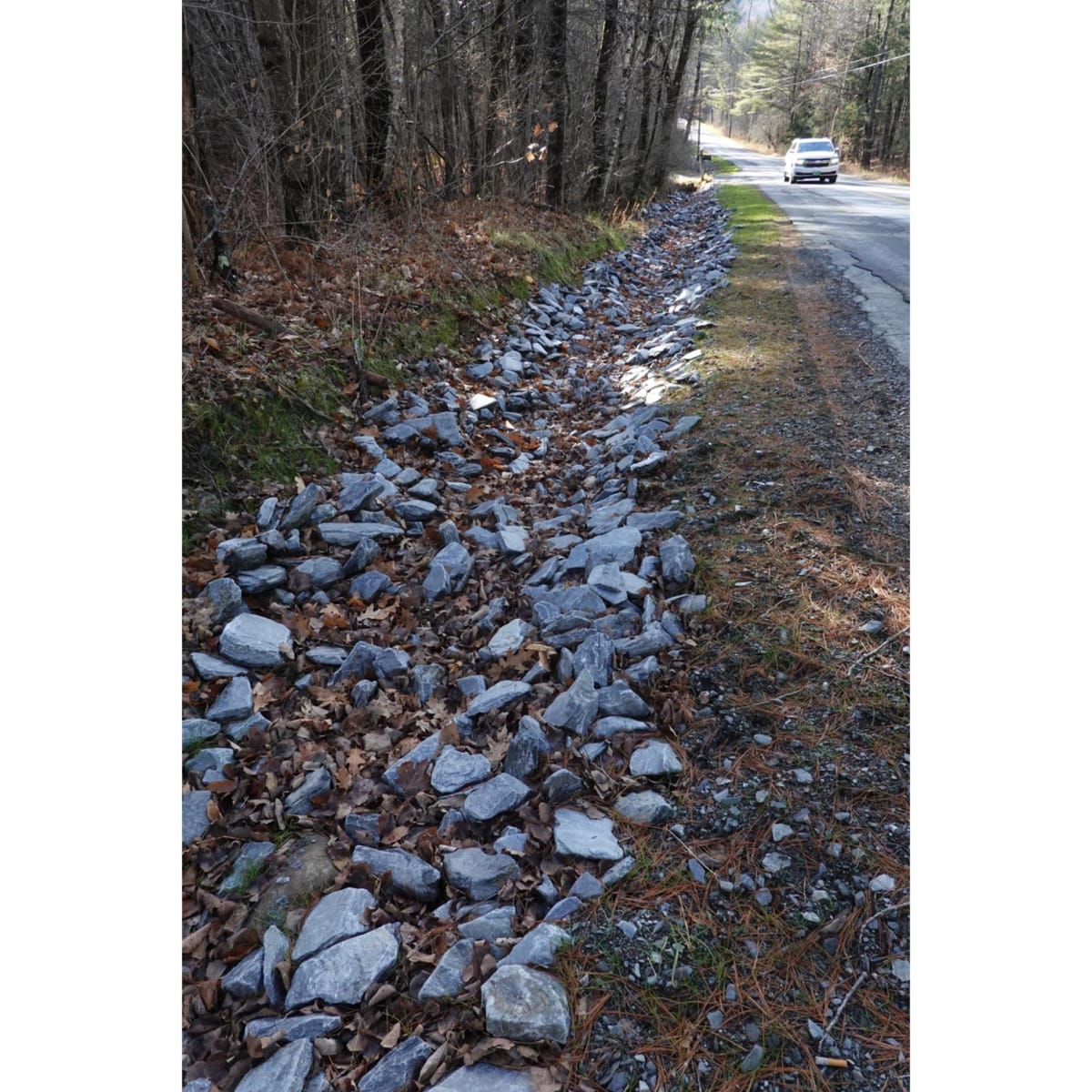 What's with the stone-lined ditches?